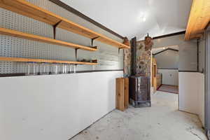 Below grade area with a wood stove