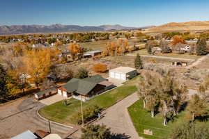 View from above of property with a mountainous background