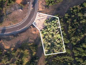 Aerial view of property's location featuring property boundaries highlighted - approximate lot lines shown