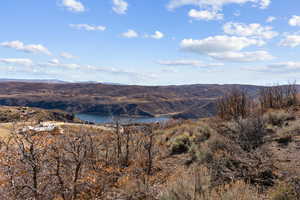 View of mountain background with a nearby body of water