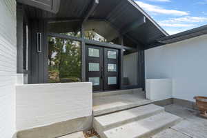 Entrance to property with french doors