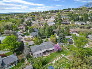 Aerial view of residential area featuring a mountainous background