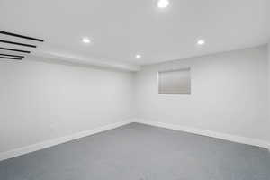 Finished basement featuring recessed lighting and baseboards