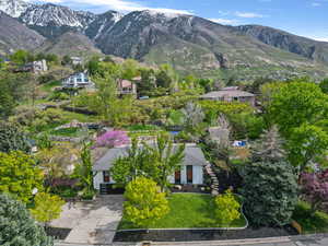 Aerial view of property's location with a mountainous background