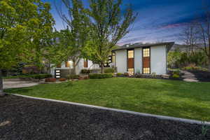 View of front of property featuring a front yard