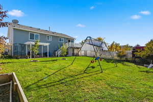 View of fenced backyard