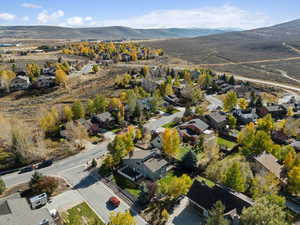 View of property location featuring nearby suburban area and a mountainous background