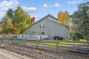 View of side of home with a chimney