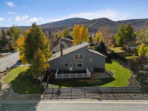 View of subject property with a mountainous background