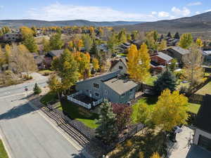 Aerial view of residential area with a mountainous background