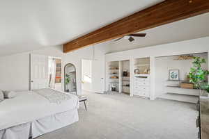 Bedroom with carpet floors and a ceiling fan