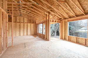 Miscellaneous room with lofted ceiling