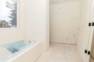 Bathroom featuring a garden tub