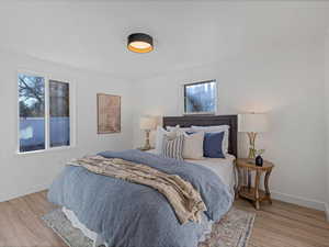 Bedroom featuring light wood-type flooring