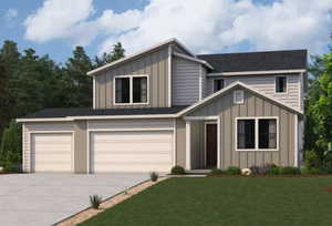 View of front of home featuring board and batten siding, driveway, a front yard, and a garage