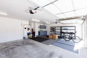 Garage featuring a garage door opener
