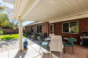 View of patio / terrace with a grill and outdoor dining space