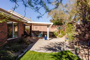 Fenced backyard featuring a patio area