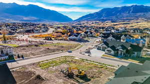 Aerial view of residential area with a mountainous background