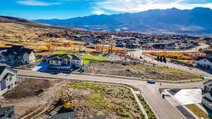 Aerial view of residential area with mountains