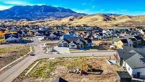 Aerial view of residential area with a mountain backdrop
