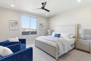 Bedroom featuring carpet flooring, ceiling fan, and recessed lighting