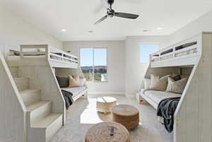 Bedroom with multiple windows, carpet flooring, ceiling fan, and recessed lighting