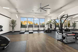 Exercise room with a ceiling fan
