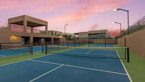 View of tennis court with community basketball court