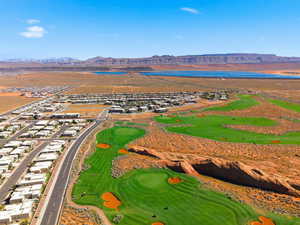 Aerial perspective of suburban area with a water and mountain view
