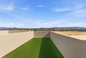 View of yard with a mountain view and a patio