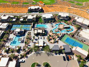 View of property location with a pool area and a golf club