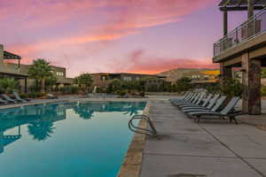 Community pool featuring a patio area, a pergola, and a mountain view