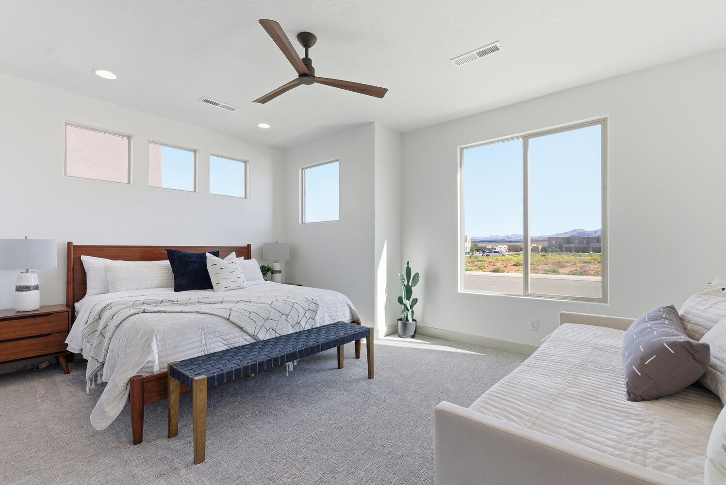 Bedroom with carpet flooring, ceiling fan, and recessed lighting