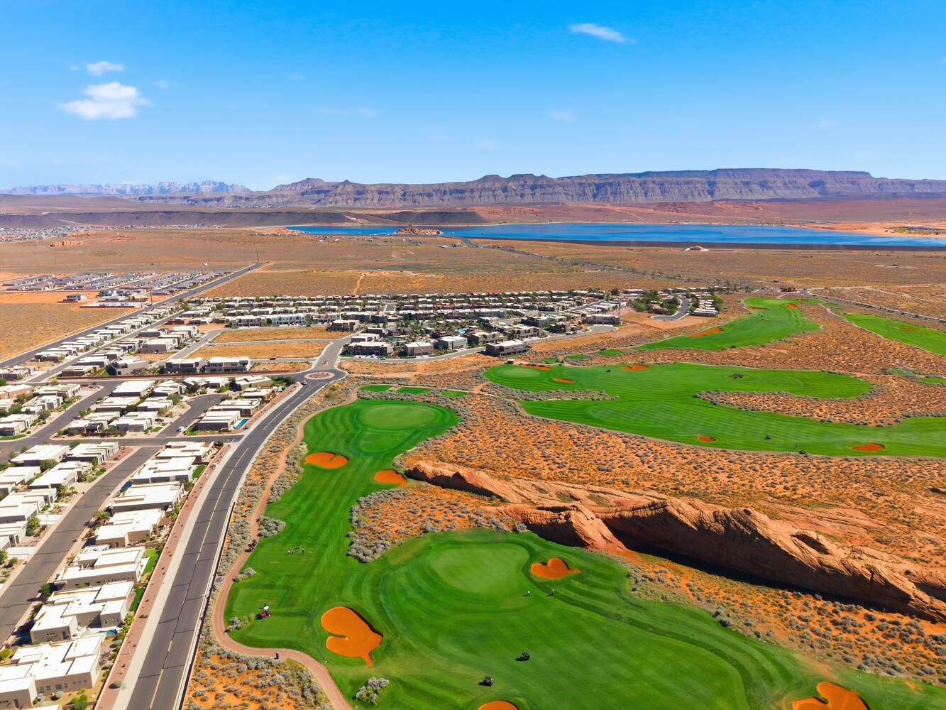 Aerial view of residential area featuring a water and mountain view