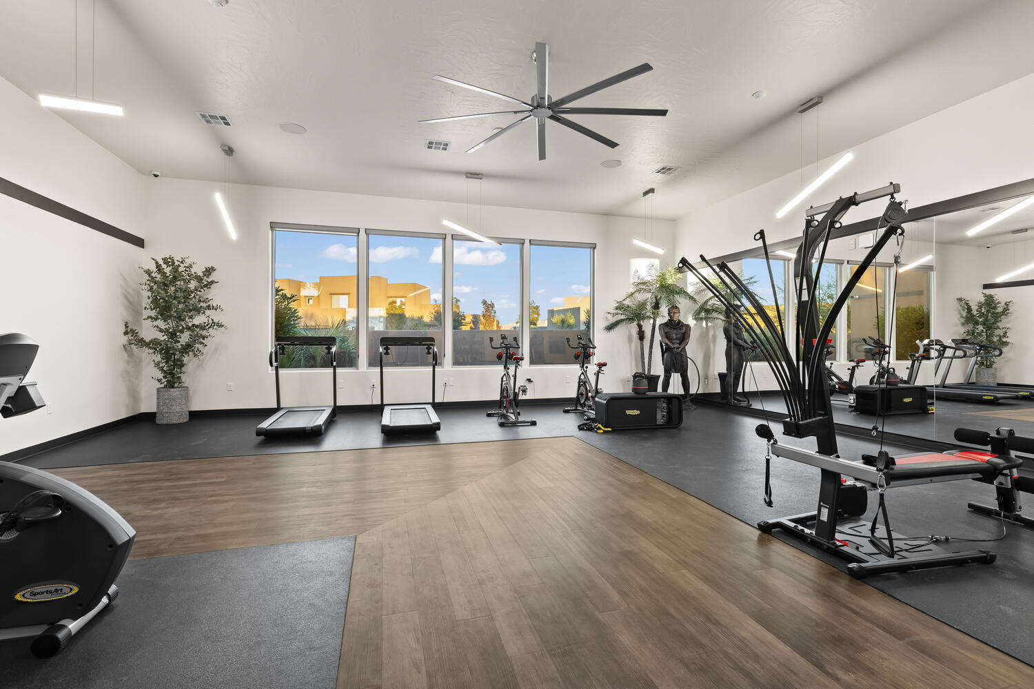 Workout area featuring ceiling fan