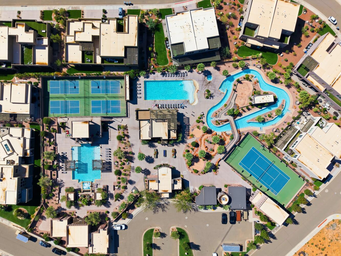 Aerial view of property's location featuring a pool area