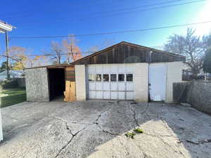 Garage featuring driveway