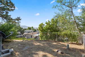View of yard with a mountain view