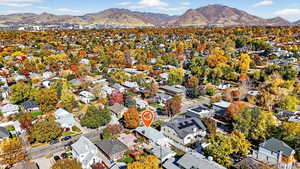 Aerial view of residential area with a mountainous background