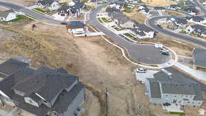 View of property location with nearby suburban area