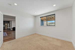 Basement apartment bedroom, #8/8, with light carpet