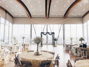 Traverse Mountain HOA Grand Hall with wood finished floors and beam ceiling