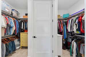 Primary walk-in closet w/d behind the door
