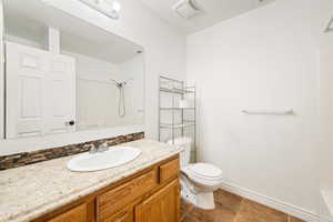 Full bath featuring vanity and bathing tub / shower combination