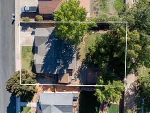 Aerial view of property and surrounding area with property boundaries highlighted