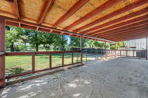 Fenced backyard with a patio area