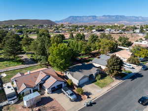Aerial view of residential area with a mountainous background