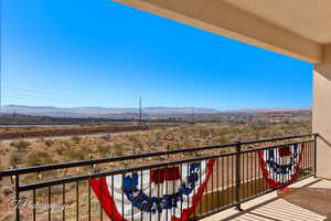 Balcony with a mountain view and a view of countryside
