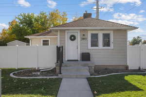 Bungalow-style house with a chimney